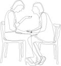 Two girls sit opposite each other and talk in confidence, one reaches out